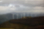 Wind Turbines in the Mountains representing our sustainability courses