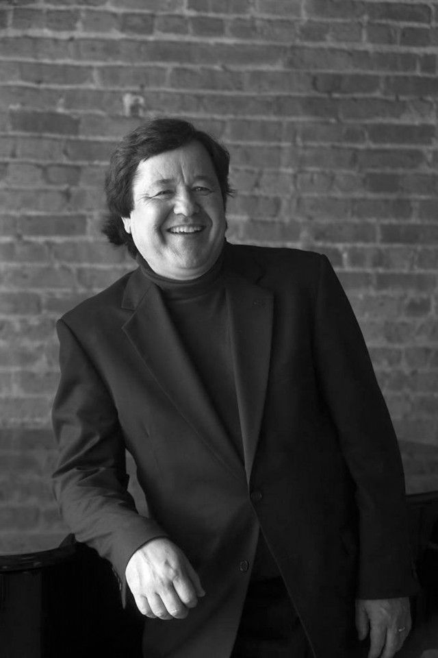 Mark-Damisch-BW-Standing-Smile-640x960.jpeg
