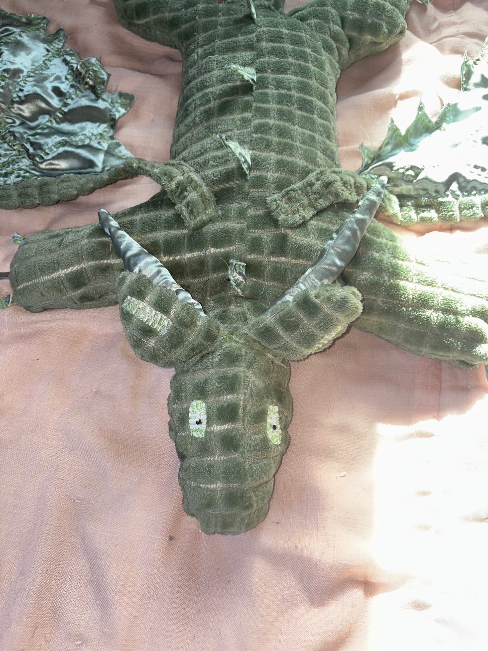 Thumbnail: Green dragon plushies