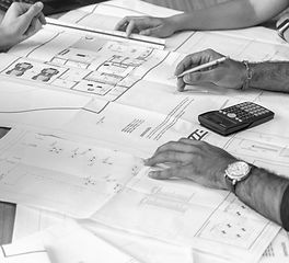 person writing on white paper_edited.jpg