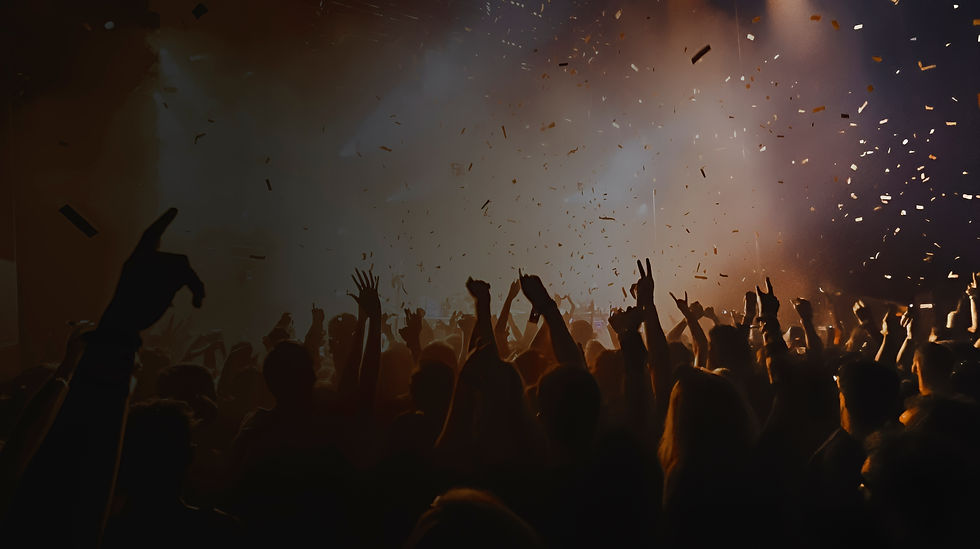 crowd-people-with-their-hands-air-concert-illuminated-by-red-stage-lights-confetti-is-fall