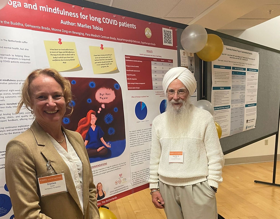 Marlies Tobias standing next to her research poster at a conference, showing her focus on evidence informed yoga therapy.