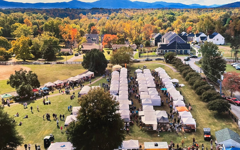 An aerial view of an event at Claudius Crozet Park