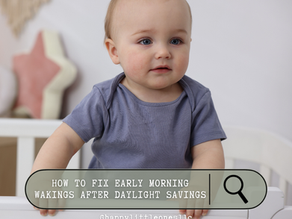 Baby standing in a crib because they're waking up early after Daylight Savings