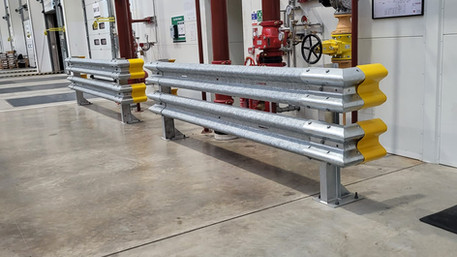 “Barrier in place near entrance—reinforcing safety where goods and people meet.”