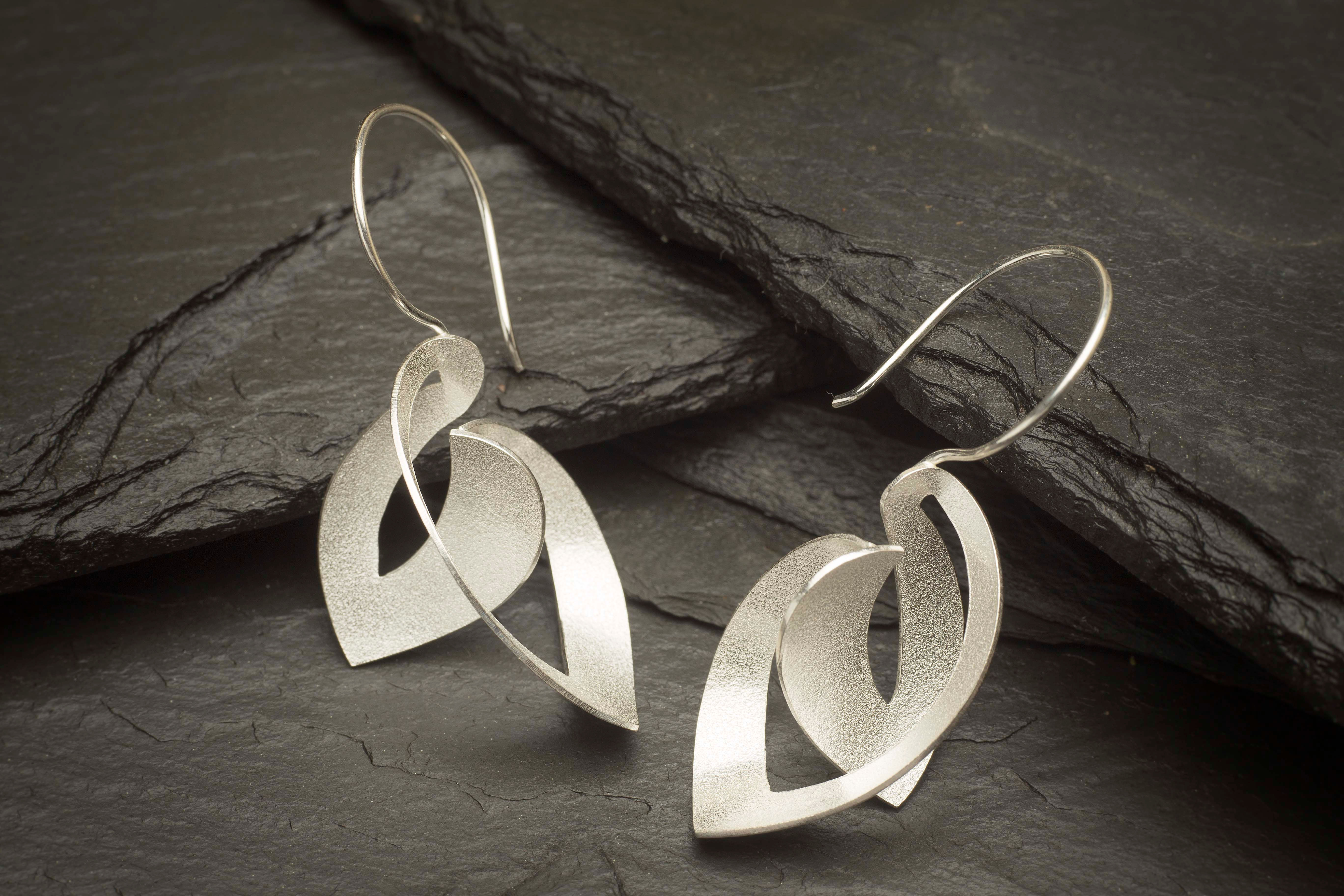 Unfolding leaf earring