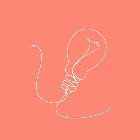 A line drawing of a lightbulb on a pink background