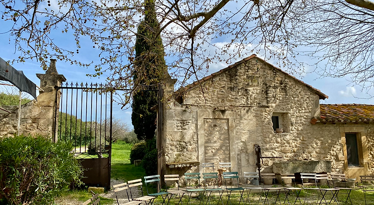 old wine cellar in france with grass and trees around