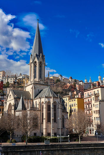 cathedral with blue sky and clouds in background