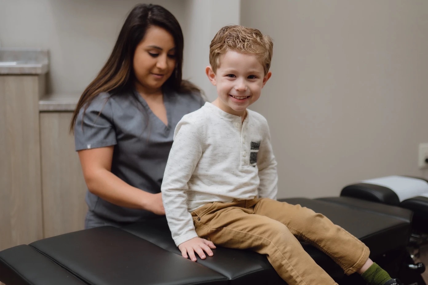 Dr. Marisa Sosa, DC delivering pediatric chiropractic care in New Braunfels, TX