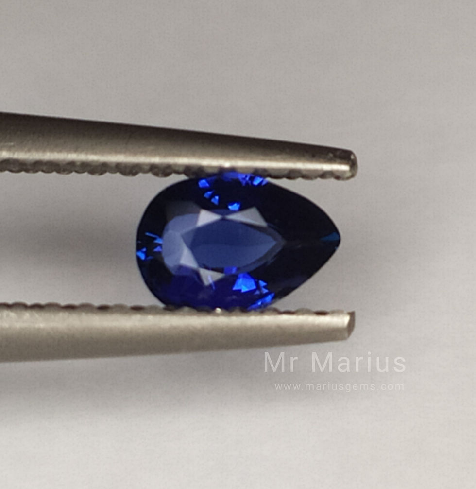 Royal blue unheated sapphire, pear cut. Front view.