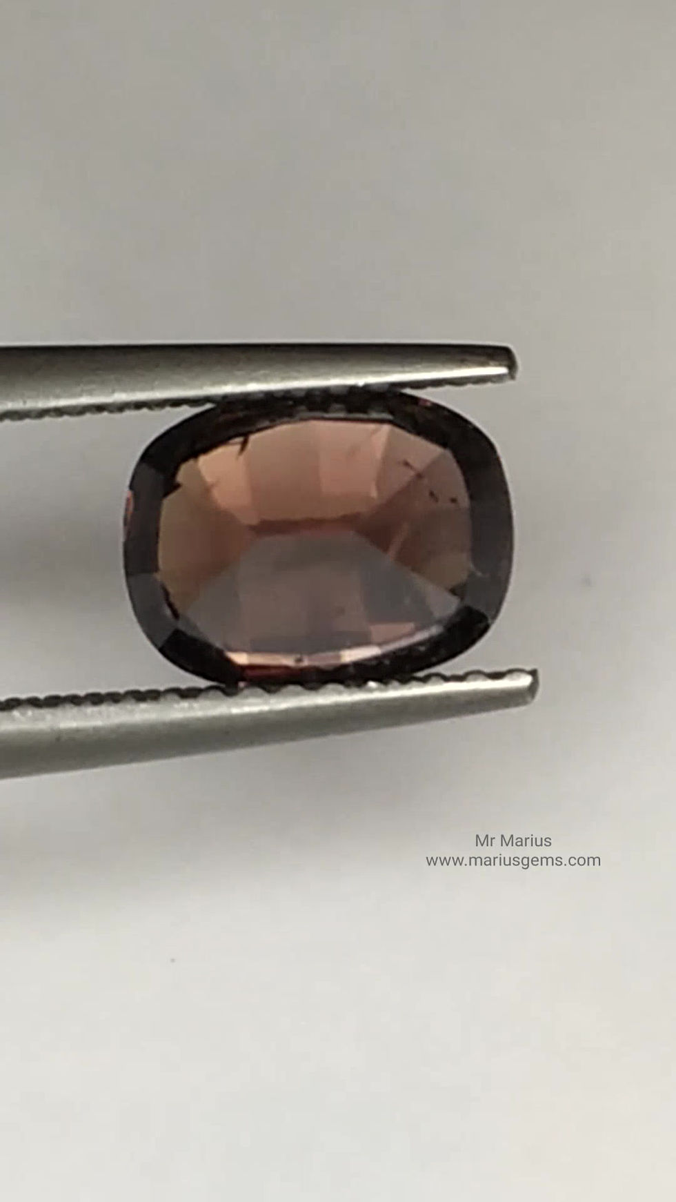 Thumbnail: Brown cushion cut zircon. Have inclusions.