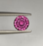 Round cut rhodolite garnet. Purpelish pink colour.