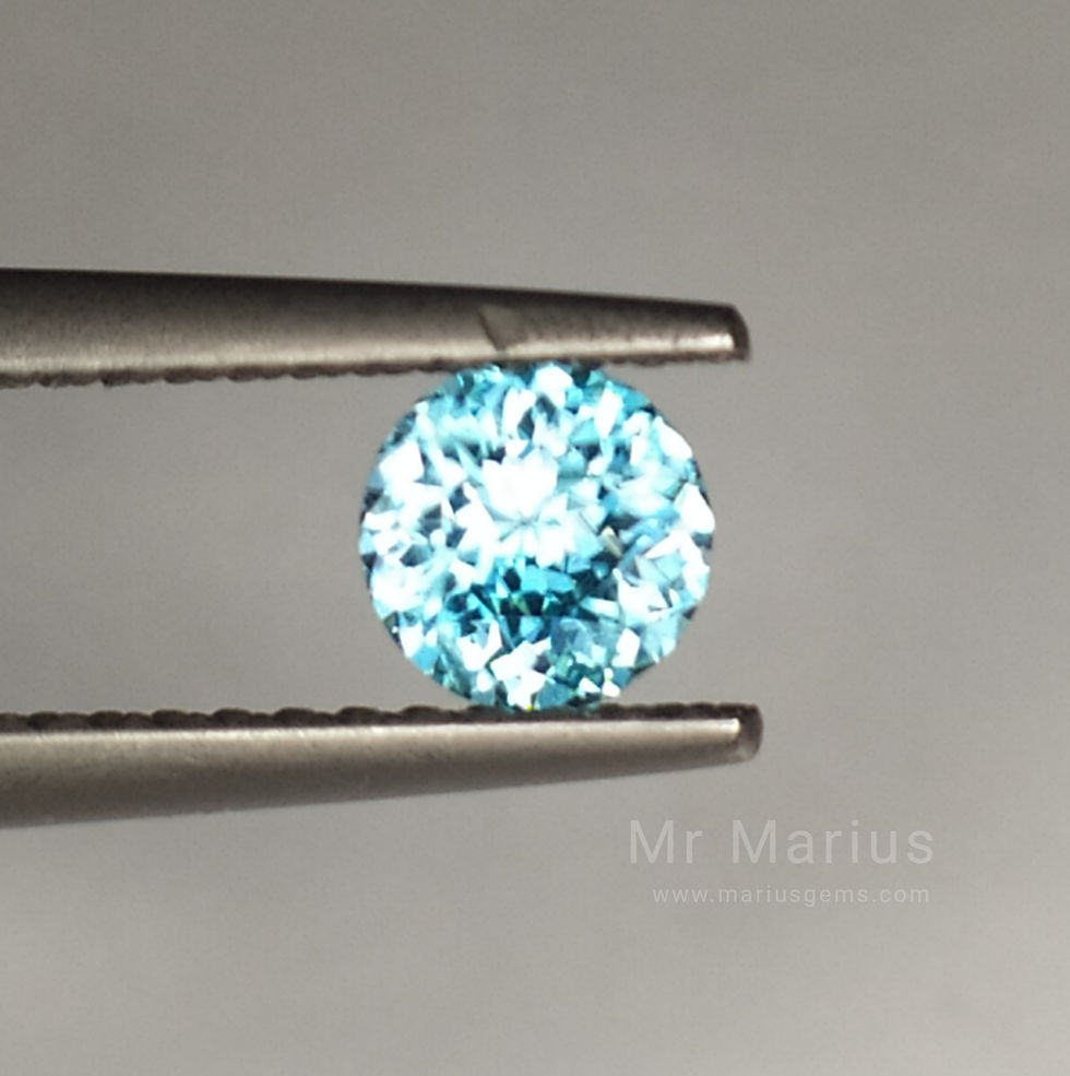 Thumbnail: Round blue zircon with alot of sparkeling.