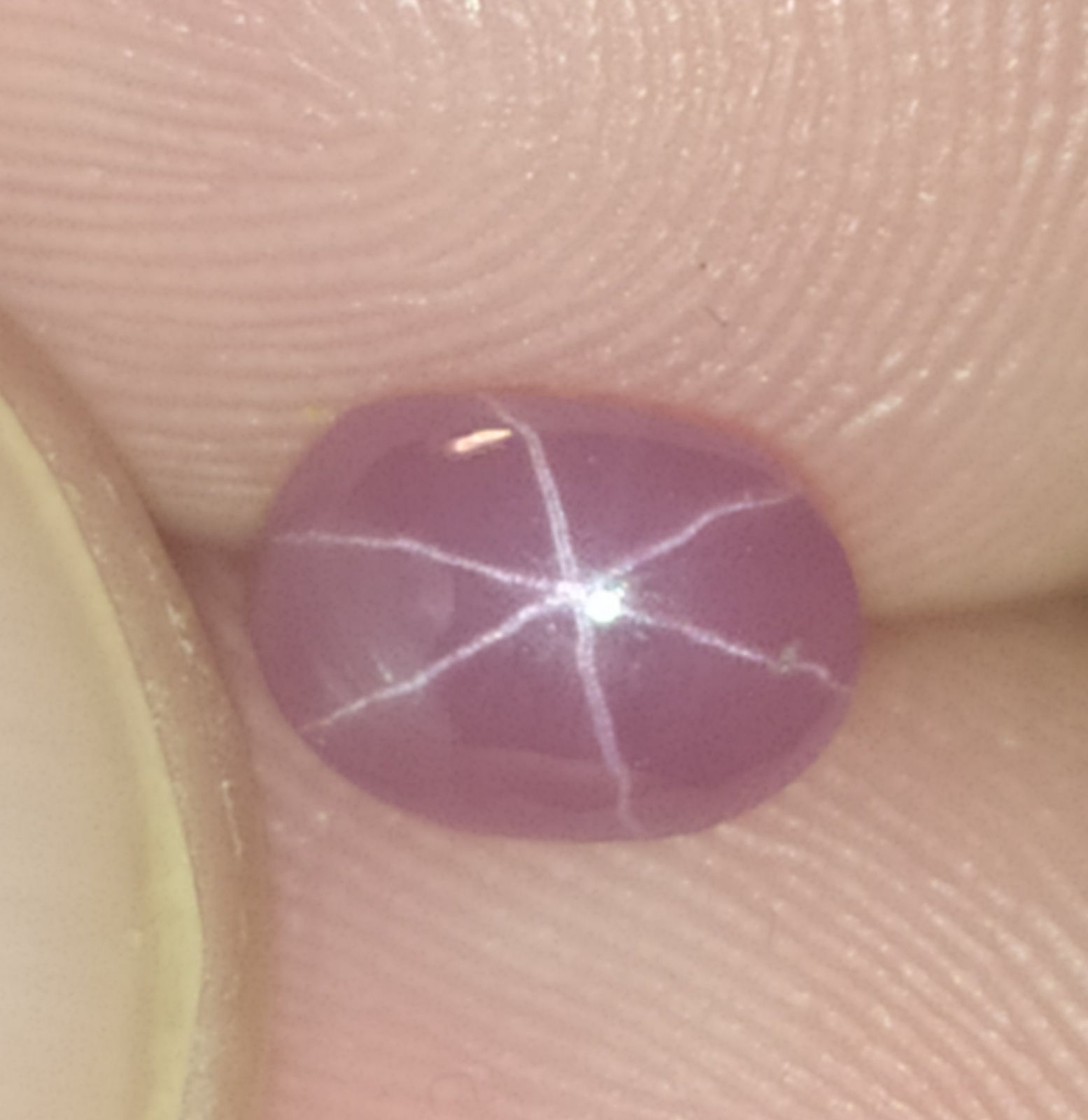 Pink "milky" star spinel, 0,70 carat, oval shape cabochon.