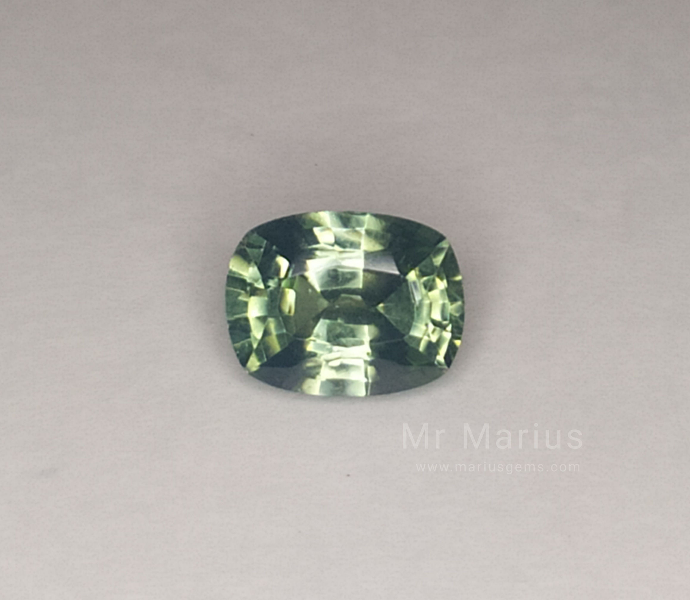 Mint green zircon, cushion cut.
