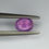Thumbnail: A soft pink colour. Oval cut unheated sapphire. Picture of pavillion side,