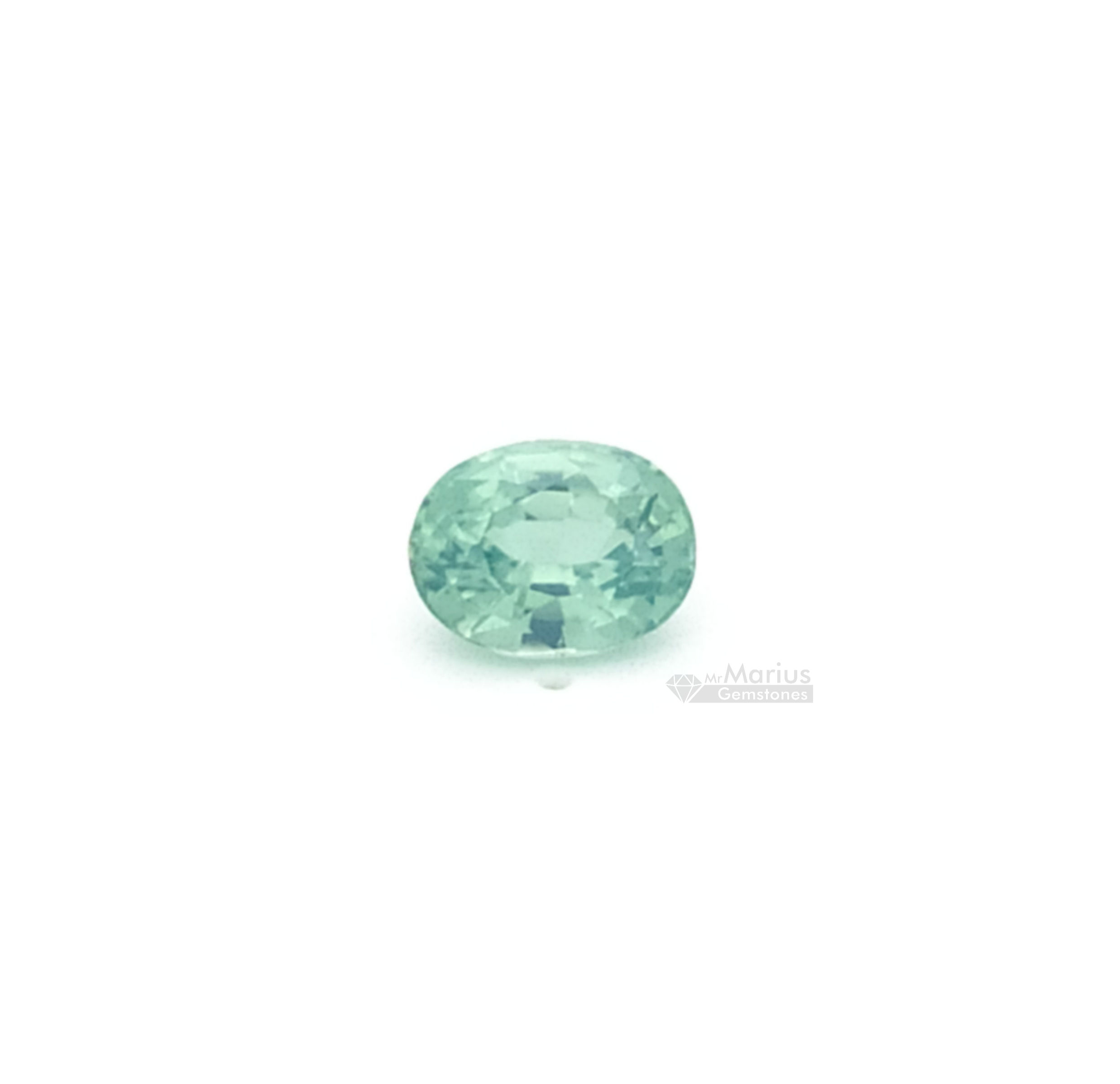 Mint green zircon, oval cut, clean gem.