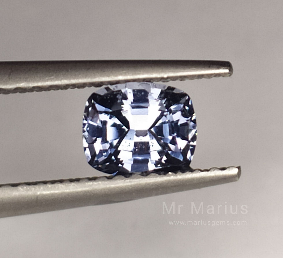 Thumbnail: Bright light blue cushion cut spinel.