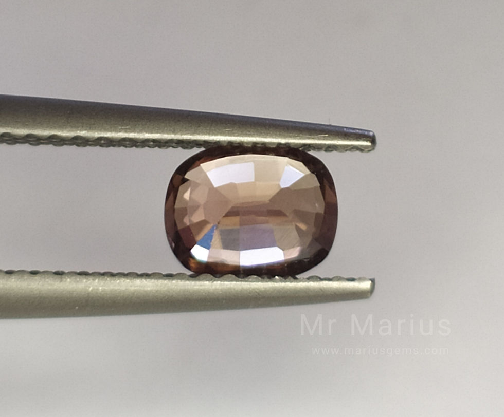 Thumbnail: Light brown zircon, clean gem. Pavillion side photo.