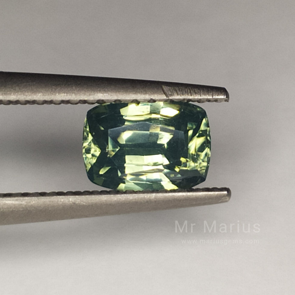 Thumbnail: Green zircon, cushion cut, clean gem.