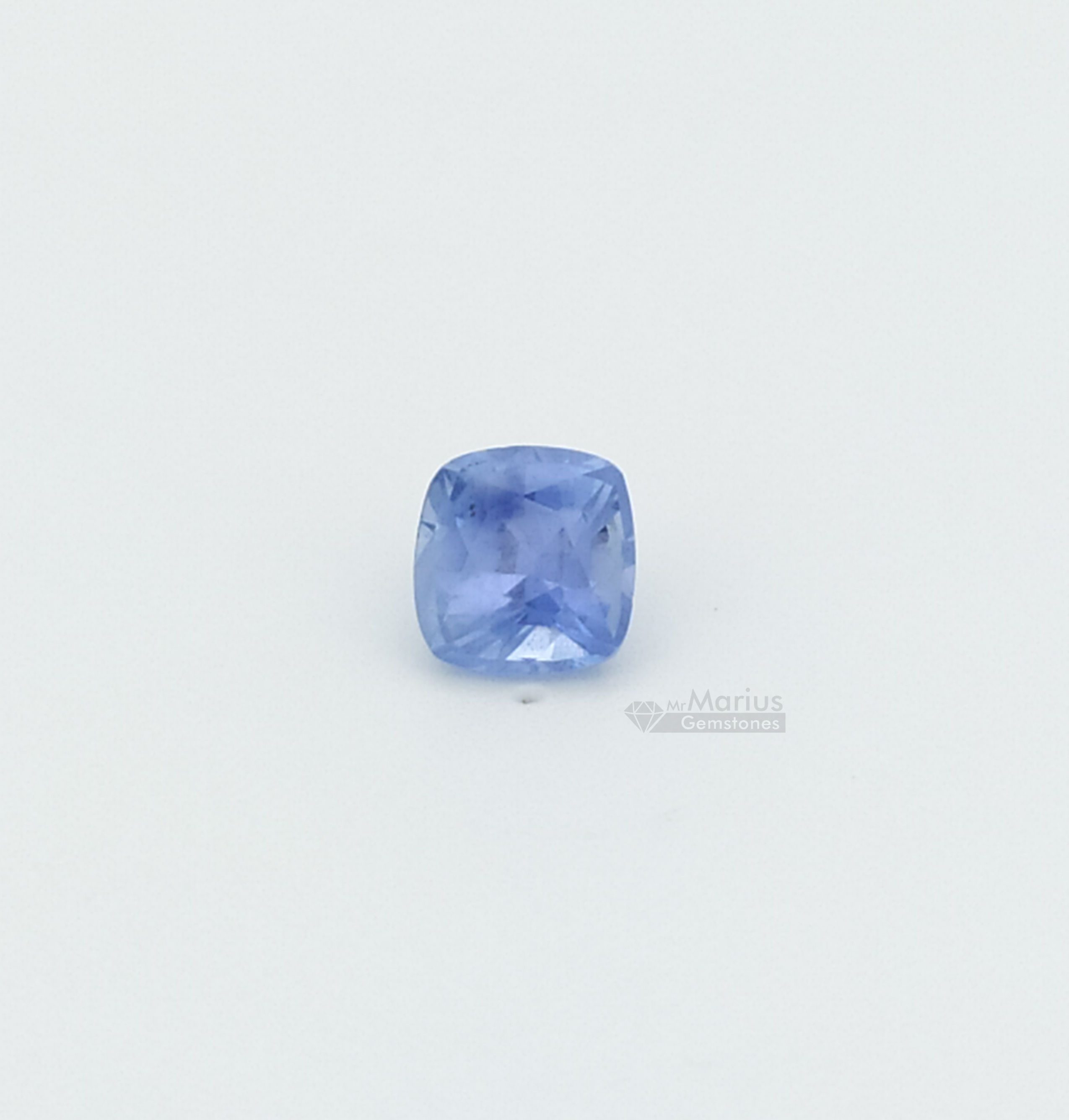 Light blue unheated sapphire, cushion cut.