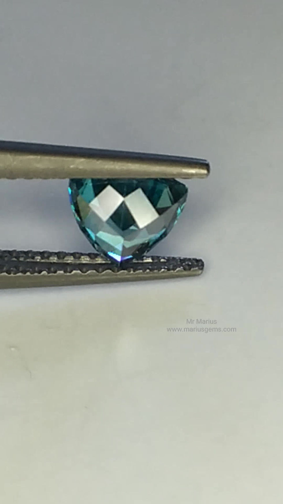 Thumbnail: Nice triangular shaped blue zircon.