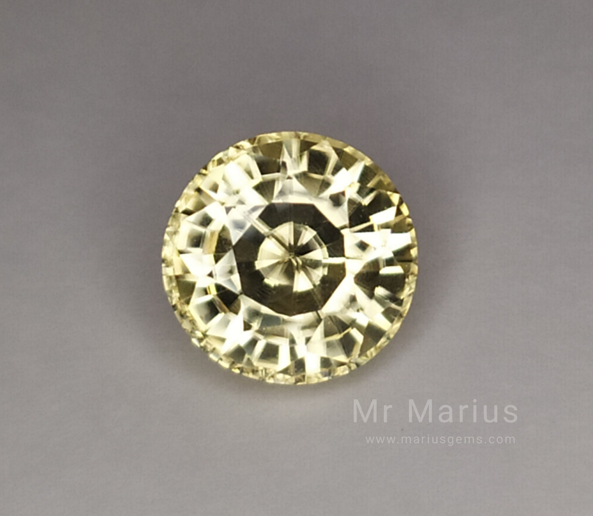 Yellow zircon, alot of sparkling in this round cut gem.