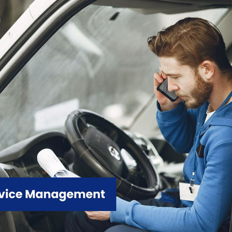 Man holding phone and sitting in van wearing blue shirt, Forcelink article cover