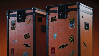 LEGO McLaren Formula 1 helmet sets 2026 teaser showing Oscar Piastri and Lando Norris brick-built helmets in papaya McLaren colours