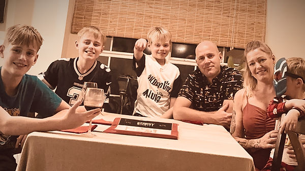 family gathered around a table at home