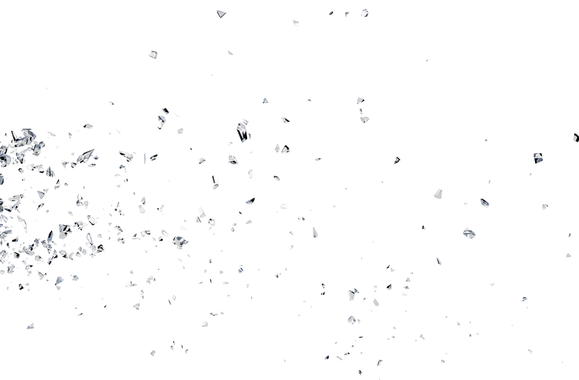 Scattered shards of glass suspended in motion on a black background, creating a dynamic and explosive visual effect.