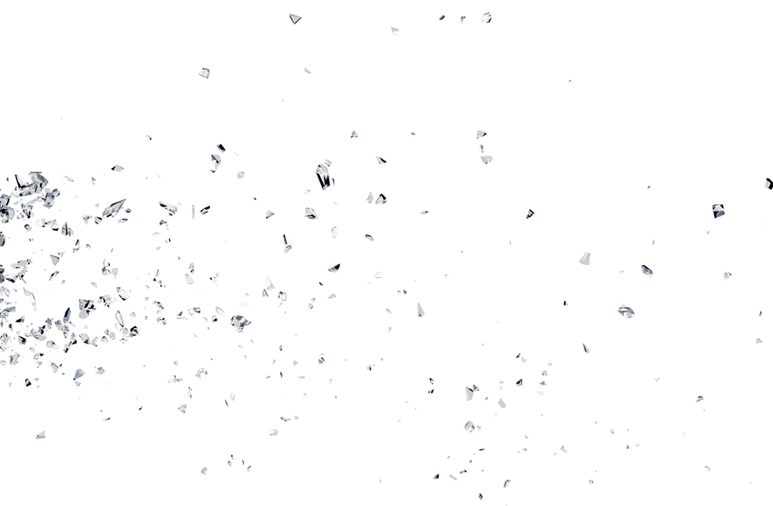 Scattered shards of glass suspended in motion on a black background, creating a dynamic and explosive visual effect.