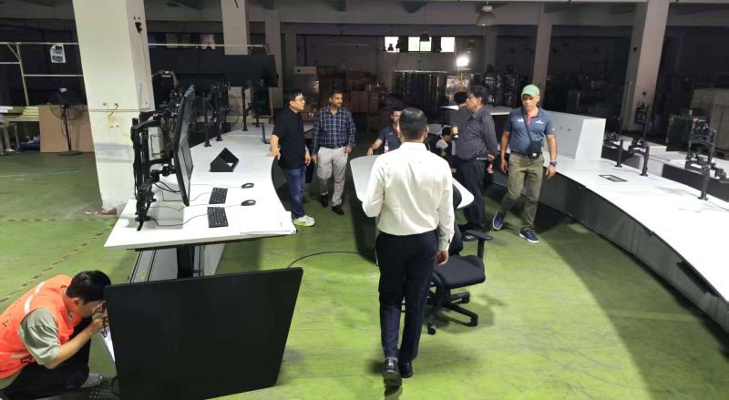 Cable routing and labeling inside Weimiao’s FPSO control desk.