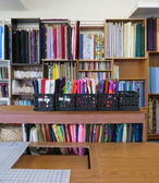 Simple Sewing Fabric Shop Fabric on shelves inside Napa Sew and Vac
