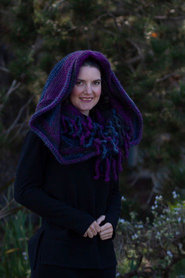 Purple Ocean Sunset
Crochet hat and shawl "rain catcher" set. 
Shawl turns into a head protector when the rains come.