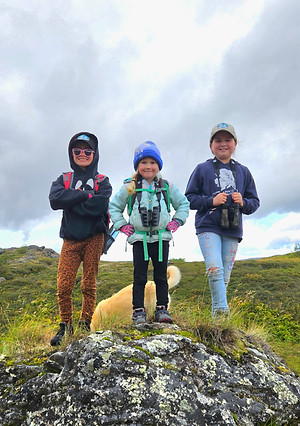 The owners kids out on a family hiking trip.