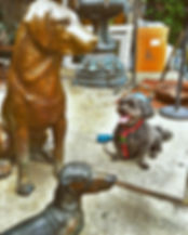charlie and statues.jpeg