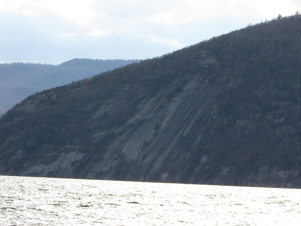 "Rogers Rock" or "Rogers Slide" as viewed from Black Point on Lake George. According to legend, Rogers slid down this rockface while fleeing a French and Native force. Photo from Tim Dusablon.