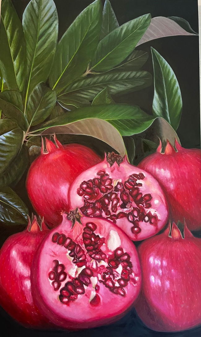 A close up of various stacked pomegranates, one split down the middel with the seeds and tendrils exposed, painted in oil by Mexican artist Federica Sada