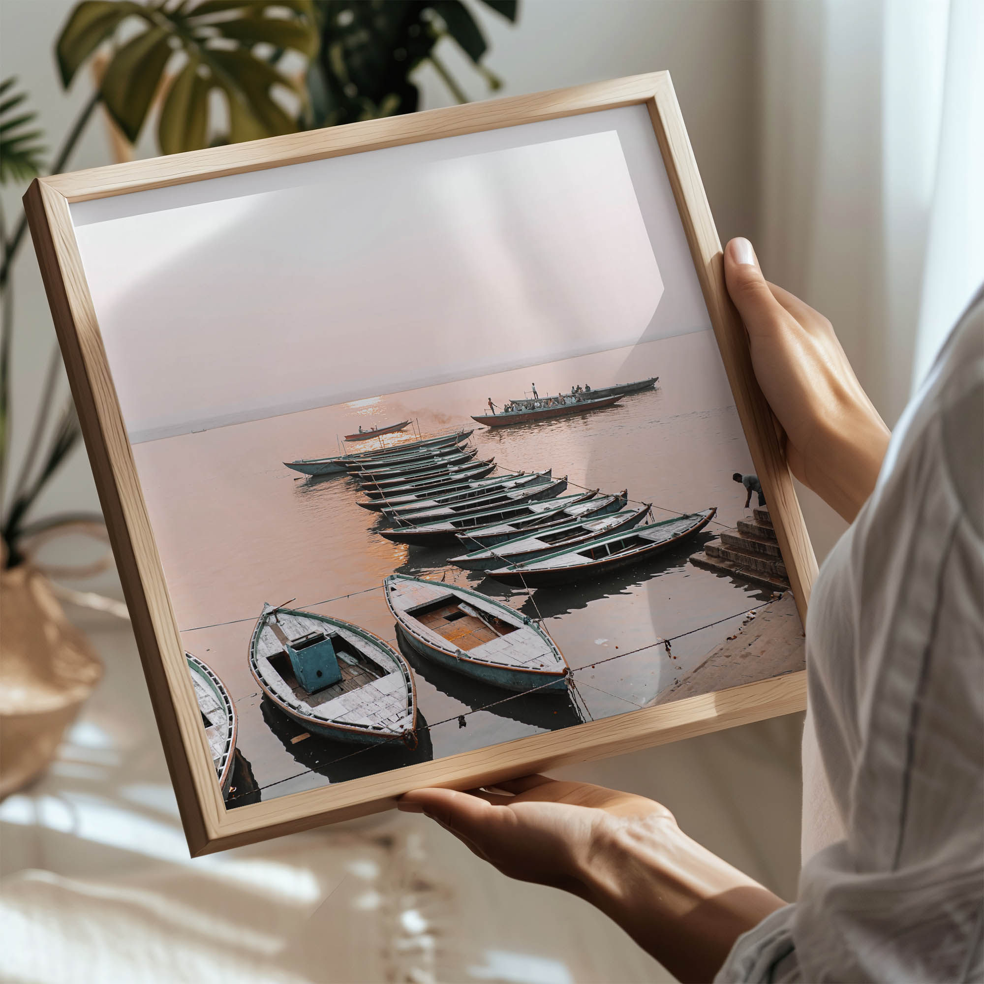 Photography Art Print of wooden boats floating gently along the tranquil banks of the river Ganges in Varanasi
