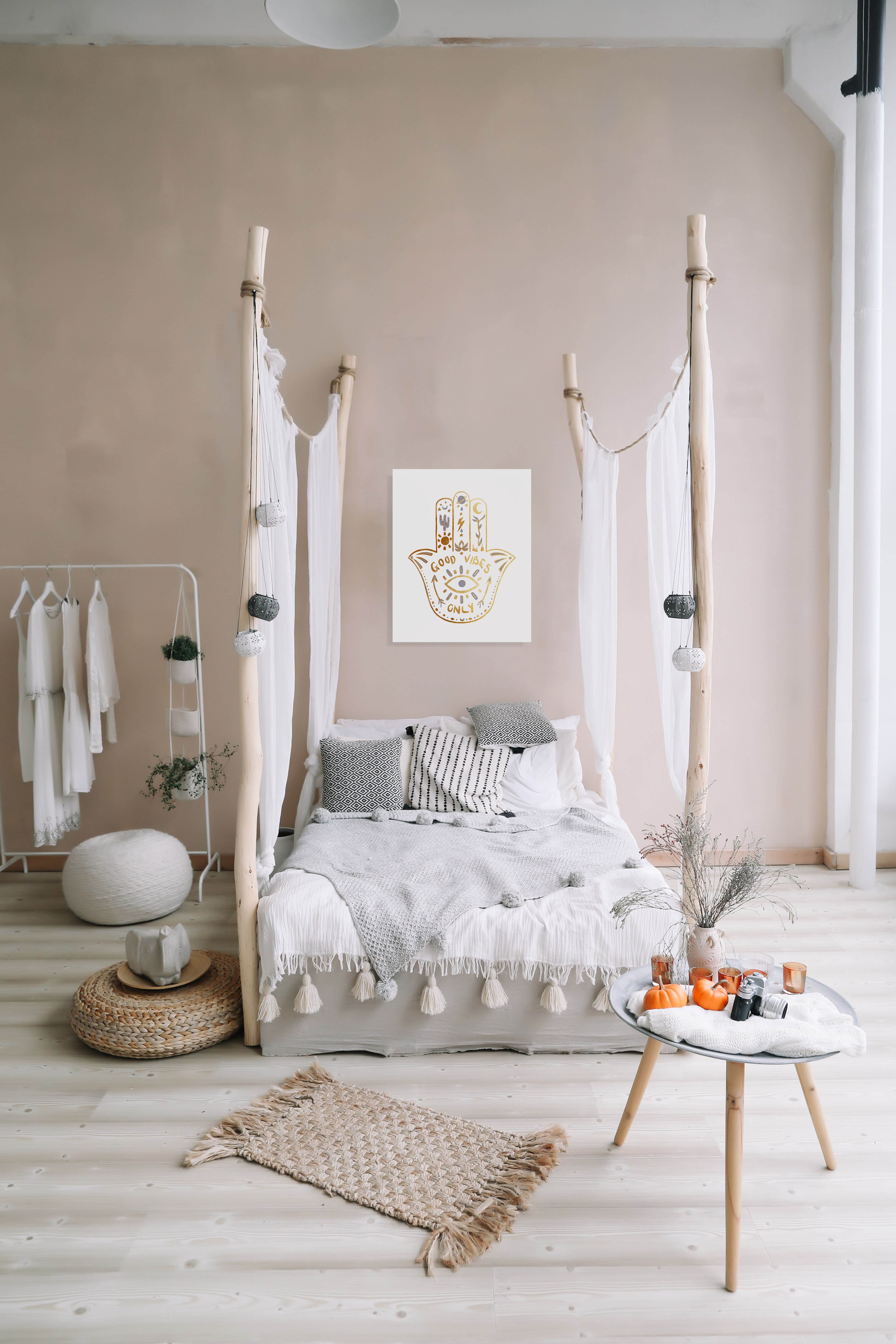 White and gold Boho Hamsa Hand Art Print displayed in Boho bedroom