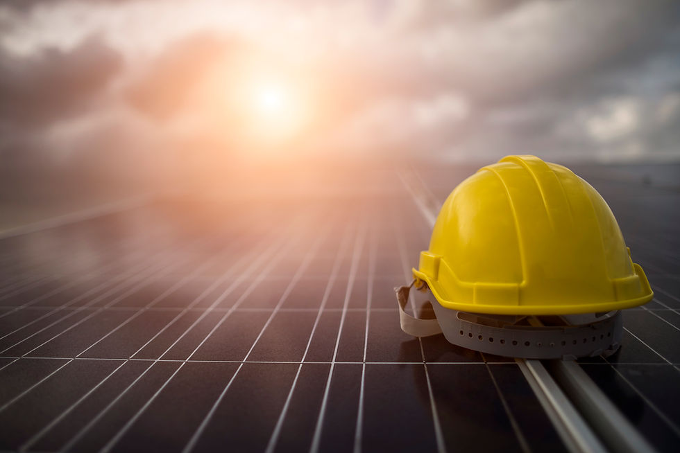 yellow-safety-helmet-on-solar-cell-panel