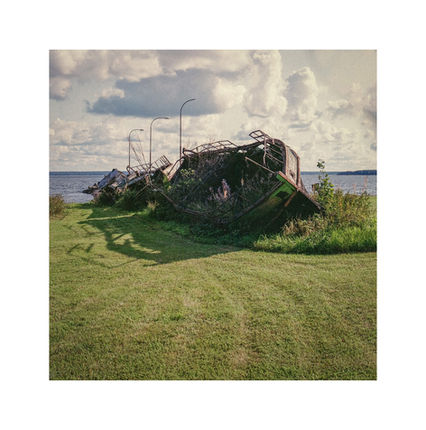 Destroyed boats on a beach.
