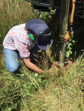 Clearing the sampling point location prior to soil coring