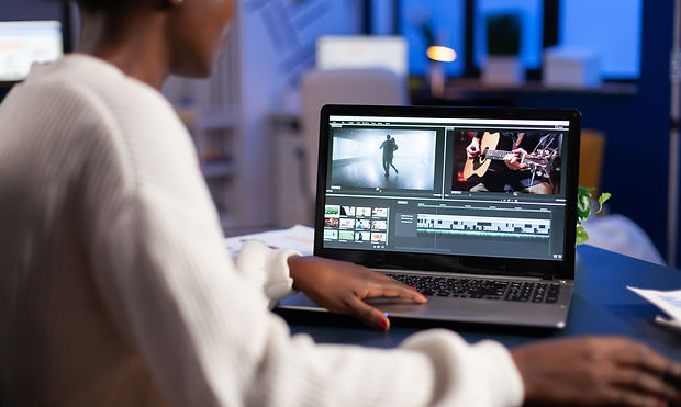 black-video-editor-working-overtime-at-new-project-SJWYXG6.JPG