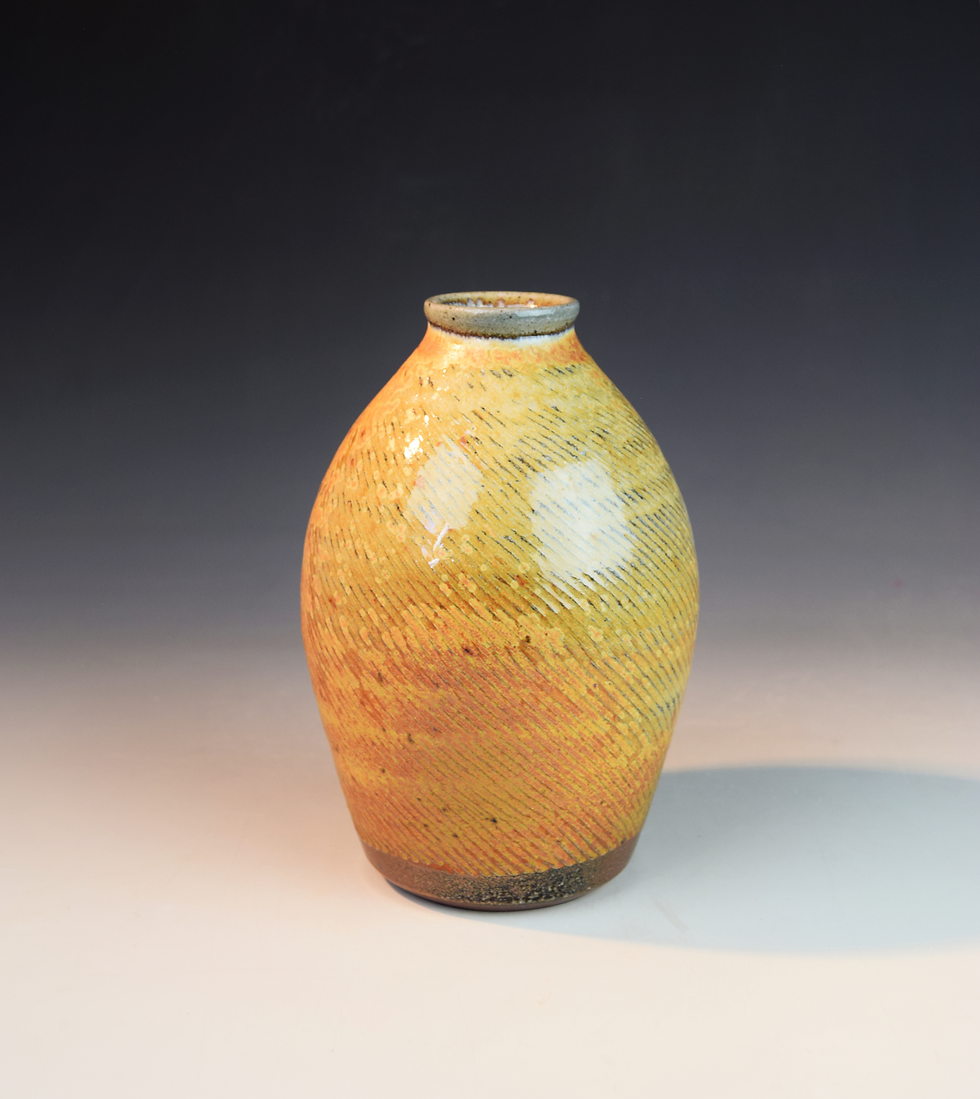 Soda fired round vase