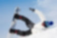 Snowboarder falling and injuring himself