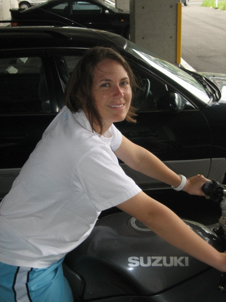 Jen on her Suzuki sport bike in a Japanese parking garage during her time stationed in Japan with the Navy.