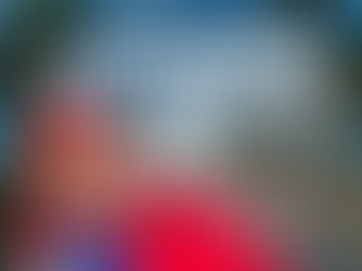 “Universal Studios Hollywood December 2025 promotions graphic featuring Super Mario waving on a red carpet leading to the Universal Studios Hollywood entrance, surrounded by palm trees and a bright blue sky. Promotional theme highlights Universal Hollywood vacation deals and Super Nintendo World travel planning.”